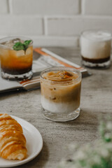 a few cups of coffee and bread, as the morning shines on the wooden planks