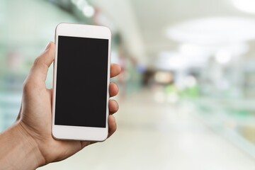 Hand with smartphone with empty blank screen