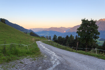 Fototapeta premium Panorama view with alpine mountains and blue sky in Salzburgerland, Austria