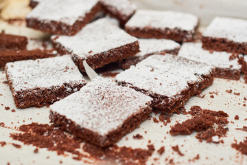 Fototapeta na wymiar Chocolate brownies on a metal tray freshly made.