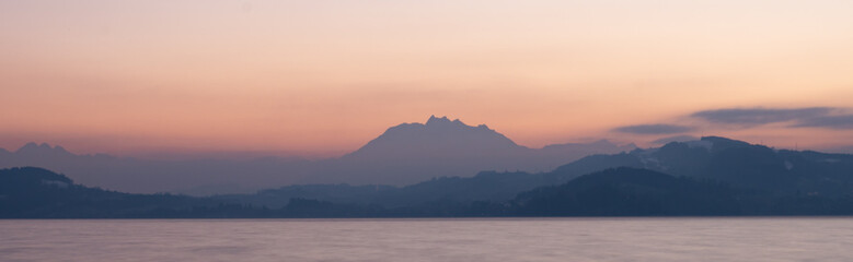 Sunset view of Vierwaldstaettersee, Switzerland, with view of mount Pilatus during sunset. 