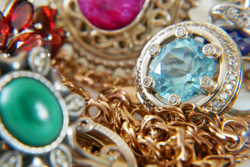 many gold jewerly with vinatge rings and earrings background, pawnshop concept, shop concept