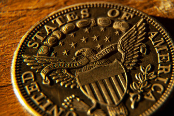 Close up fragment of an ancient US Dollar coin as symbol of economy and money of United States