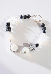 jewel handmade bracelet with semipreciouse stones at white  background