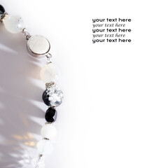 jewel handmade bracelet with semipreciouse stones at white  background