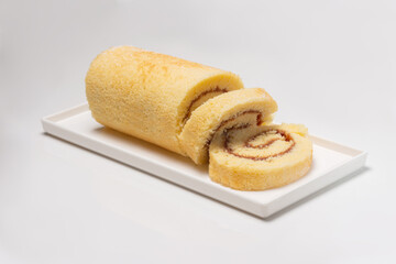Brazilian sweet called Bolo de Rolo in slices.