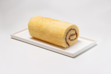 Bolo de rolo, a typical Brazilian sweet. White background.