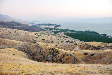 Shore of Lake Kinneret, the slopes of the Golan Heights in Israel