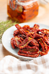 Sun dried tomatoes on plate.