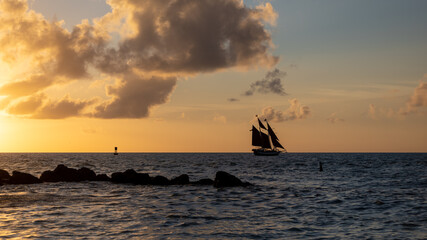 Silhouette of a pirate ship during coloful sunset, Key West, Florida, USA.