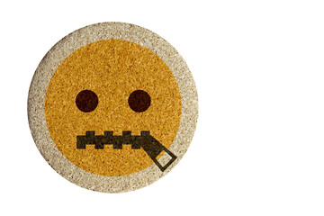 zipper mouth face,round cork table coaster on a white background