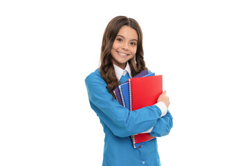 cheerful face of teen girl with long curly hair hold school workbook isolated on white, homework