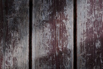 Beautiful wooden background with vertical lines and autumn ray of sunshine. Board background