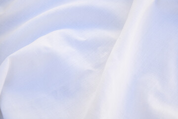 moving white linen fabric