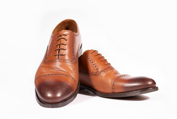 Men's brown shoes on a white background. Isolate. Beautiful men's shoes