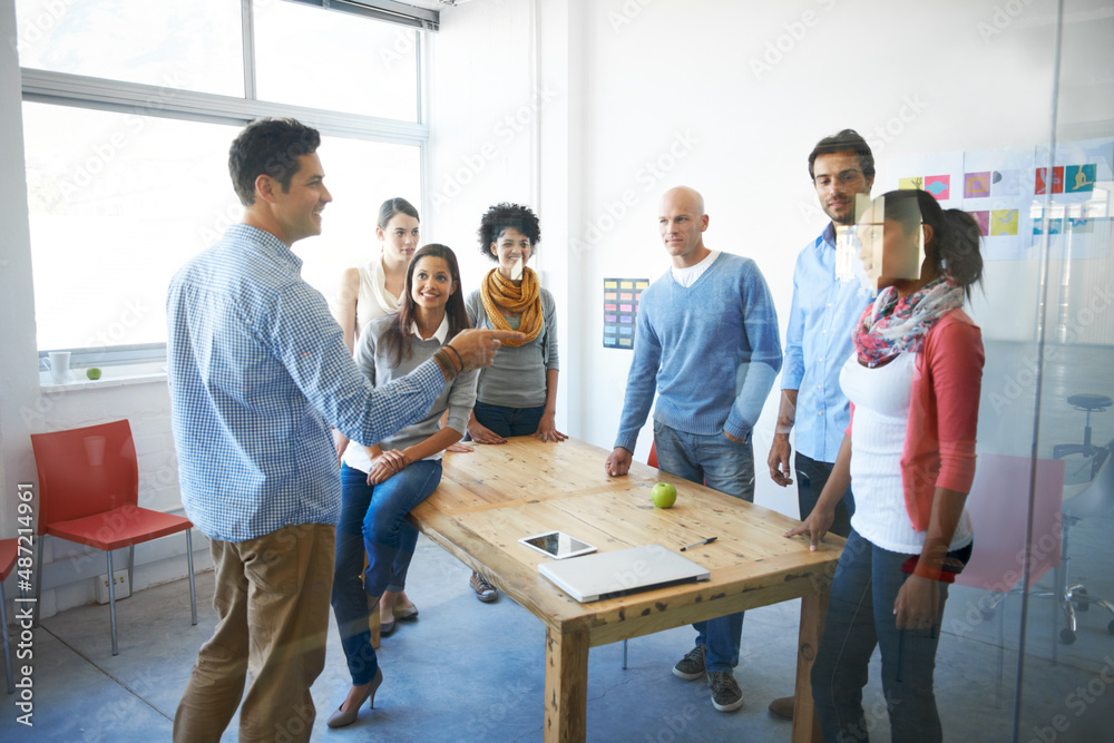 Poster theres no better work than teamwork. shot of a group of casually dressed businesspeople in the offic
