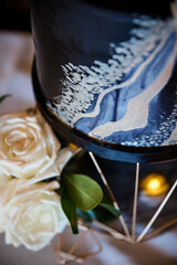 Stylish black and white wedding cake