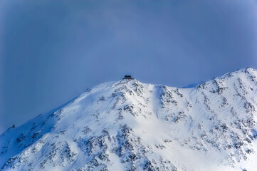 Austrian Alps mountain peaks covered with snow during winter time.