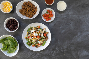 Taco Salad and Ingredients with Room for Copy