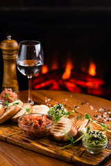 Set of snacks for beer on a wooden board