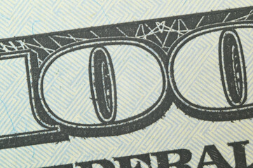 figure 100 is a close-up on a bill of one hundred American dollars of a new sample.