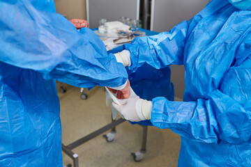 Medical team preparing equipment for surgery