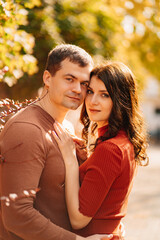 Fototapeta premium a beautiful, happy couple on an autumn walk. 