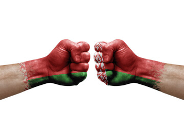 Two hands punch to each others on white background. Country flags painted fists, conflict crisis...
