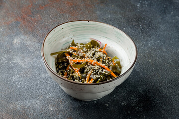 salad with seaweed, carrots and sesame seeds