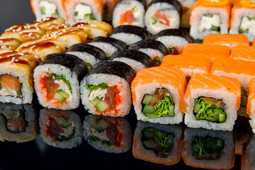 set of rolls on black with reflection