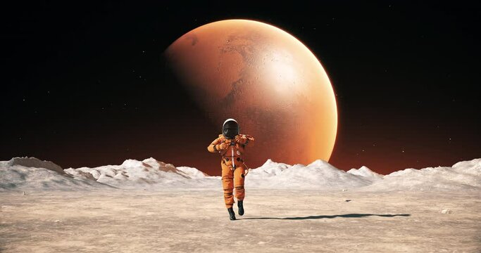 Happy Male Astronaut On The Surface Of An Alien Planet. Red Planet Is Visible In Sky. Celebrating His Success. Slow Motion.