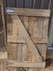 Fototapeta na wymiar Wood Exterior Bar Door Construction