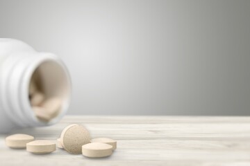 Concept of antiviral pill against coronavirus disease. COVID drugs on a medical table.