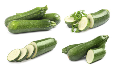 Set of fresh ripe zucchinis on white background