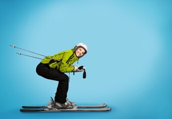 Full body skier smiling happy fun cool woman wearing warm jacket