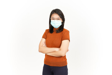 Wearing Mask And Folding Arms Of Beautiful Asian Woman Isolated On White Background