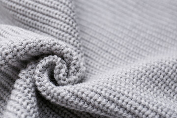 Grey knitted fabric as background, closeup view - Powered by Adobe