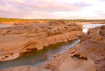 "Sam Pun Bok" Three thousand waving the rocks beneath the Mekong river. Natural sandstone group Eroded through time for thousands of years. Thailand grand canyon in Ubon Ratchathani.