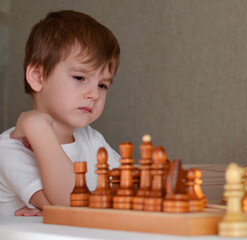 boy playing chess