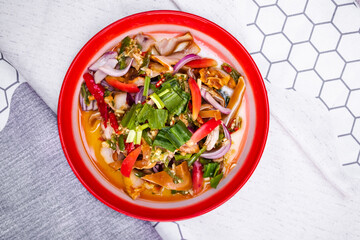 Pork Salad thai food.  spicy food traditional of asian Thai. ingredient bitter, tomato, lemon or lime,pickled fish,vegetable and spices. food for diet good health concept.