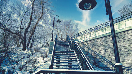 Snow covered urban stairs with snow