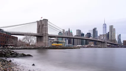 Schilderijen op glas Brooklyn Bridge & Manhattan Skyline in Winter © Peng Wang
