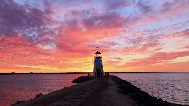 Sunset beautiful afterglow over the lighthouse of Lake Hefner