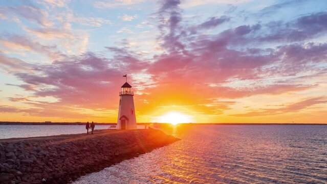 Sunset time lapse of the beautiful afterglow over the lighthouse of Lake Hefner