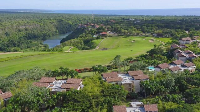 La Romana Country Club - golf course and villas next to Chavon river; drone