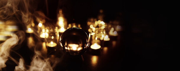 Abstract background with smoke ball and candles. Prediction of the future. Divination.
