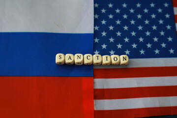 Background political. In the background are the American and Russian flags. US sanctions against...