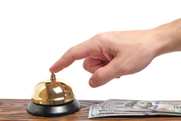 Pressing your hand bell hotel service and dollars table.Concept hotel, travel and paid holidays.