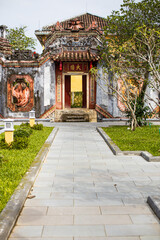 Multicoloured ceremonial temple gate in Hoi An, Cambodia