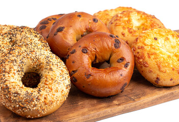 Variety of Bagel Flavors on a Cutting Board